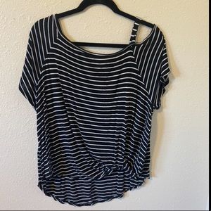 Black and white striped t-shirt.